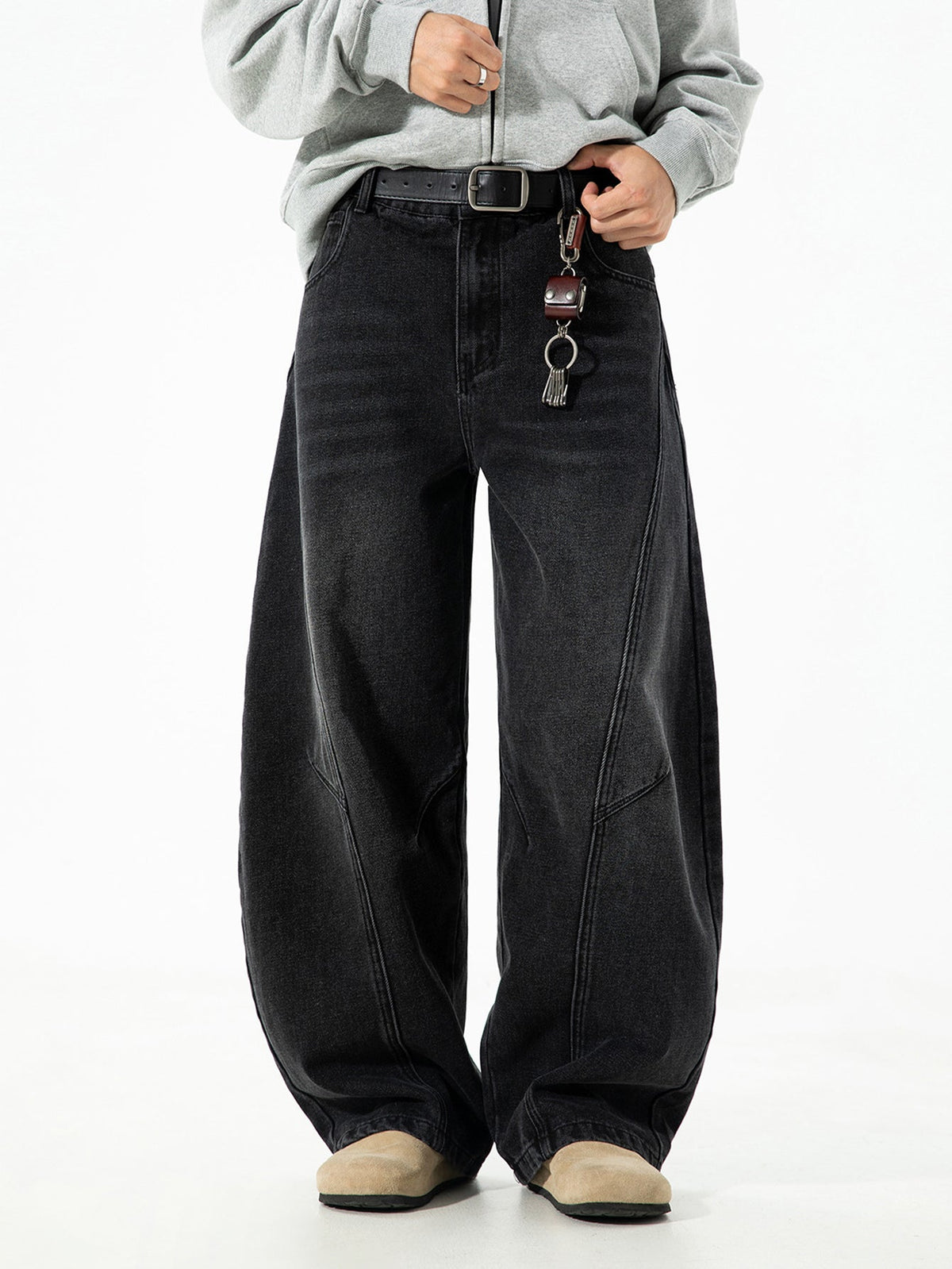 Calça jeans baggy de denim lavado e desgastado