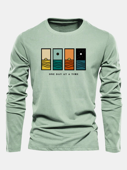 Camiseta de algodão de manga longa com estampa “Um dia de cada vez”