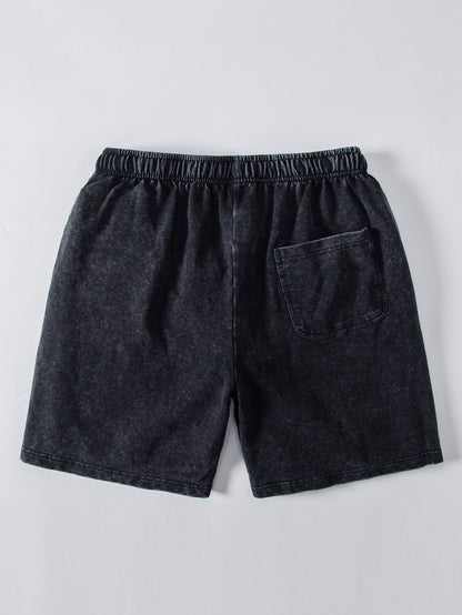 Camiseta Oversized com Ombro Caído e Efeito Desgastado Lavado & Shorts com Cordão