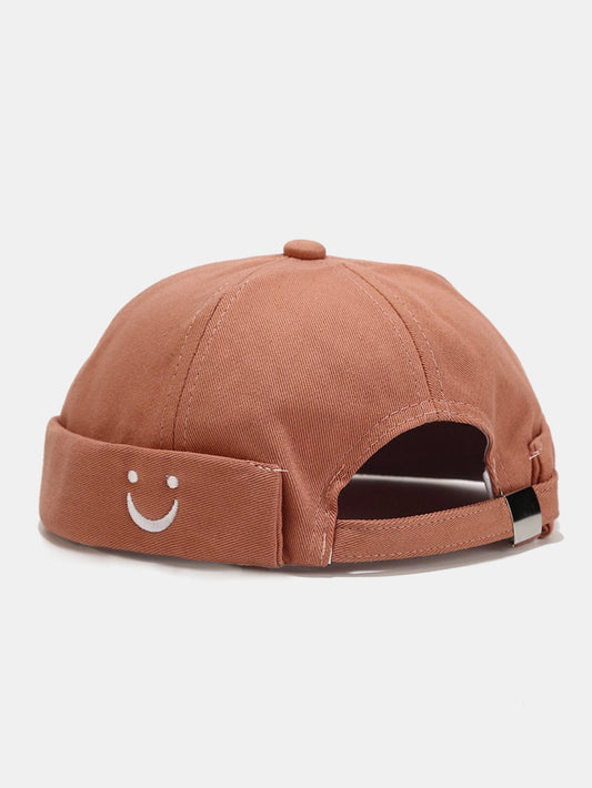 Boné ajustável de algodão sem viseira com bordado de carinha sorridente