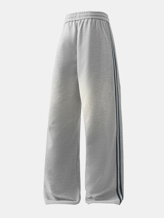 Calça de perna reta com listras contrastantes e textura waffle