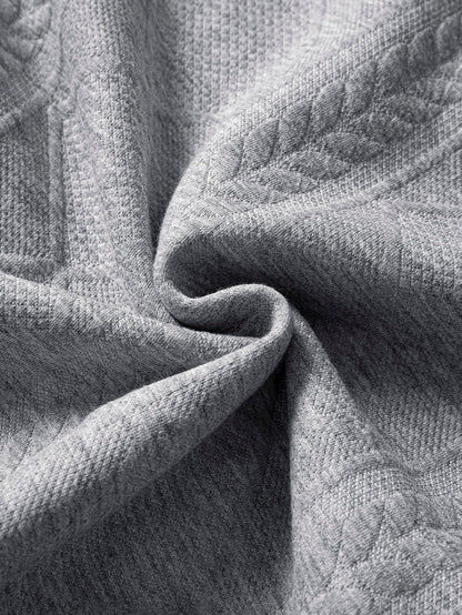 Camiseta de jacquard geométrico 2 em 1, com caimento descontraído e gola com entalhe