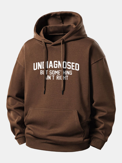 Moletom com capuz de corte confortável e estampa "Sem diagnóstico, mas algo não está certo"