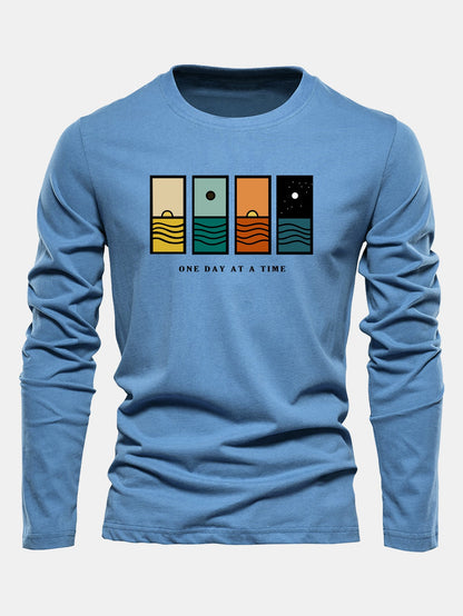 Camiseta de algodão de manga longa com estampa “Um dia de cada vez”