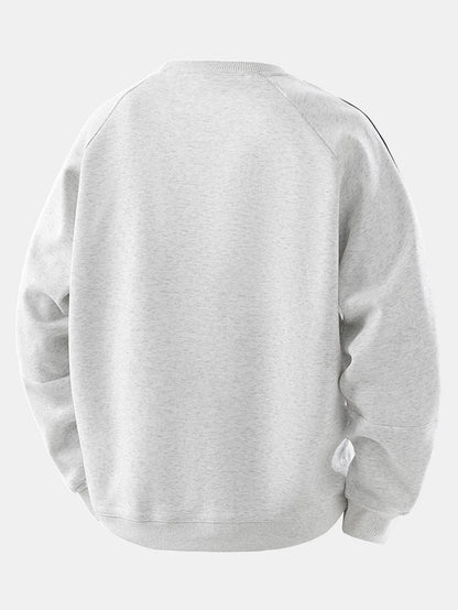 Moletom raglan vintage listrado de gola redonda e modelagem confortável