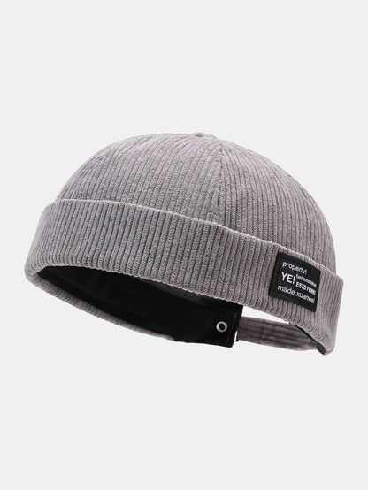 Gorro docker ajustável de veludo cotelê com etiqueta tecida