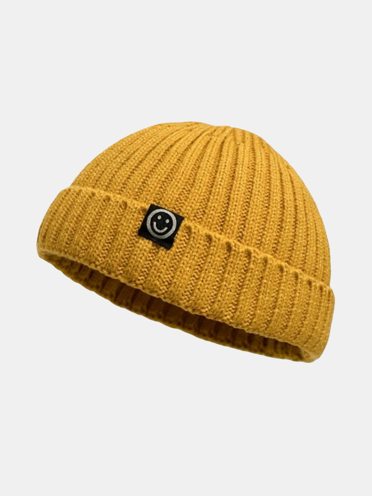 Gorro docker curto de tricô canelado com punho dobrado e etiqueta tecida de carinha sorridente