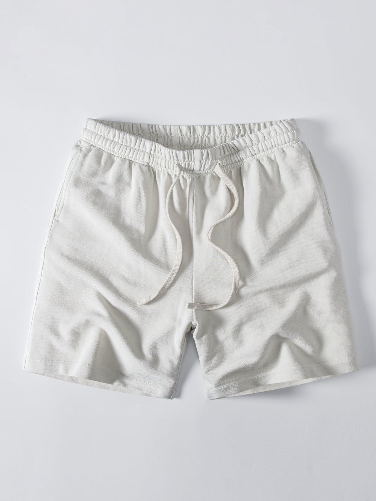 Camiseta Pesada com Ombro Caído e Efeito Lavado & Shorts com Cordão e Efeito Desgastado Lavado