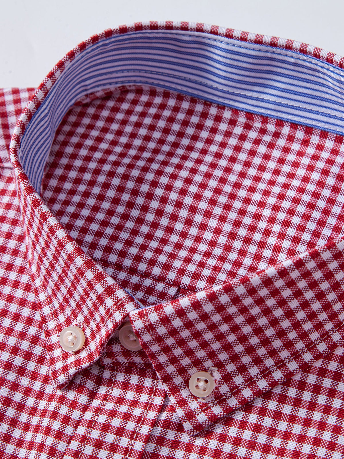 Camisa xadrez listrada contrastante com botões