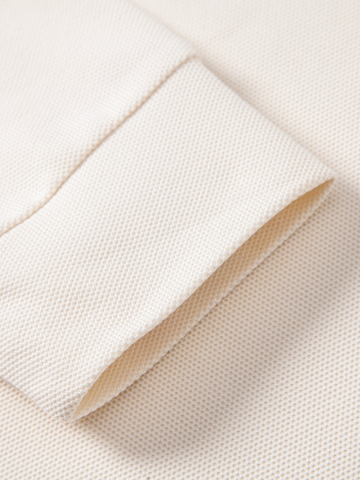 Polo de manga longa com gola contrastante