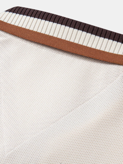 Polo de manga longa com gola contrastante